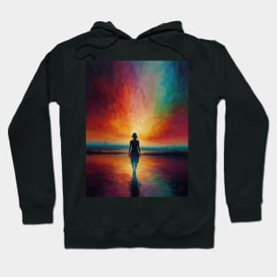 Woman Standing on Shoreline at Sunset With Radiant Sky Reflections in Water Hoodie